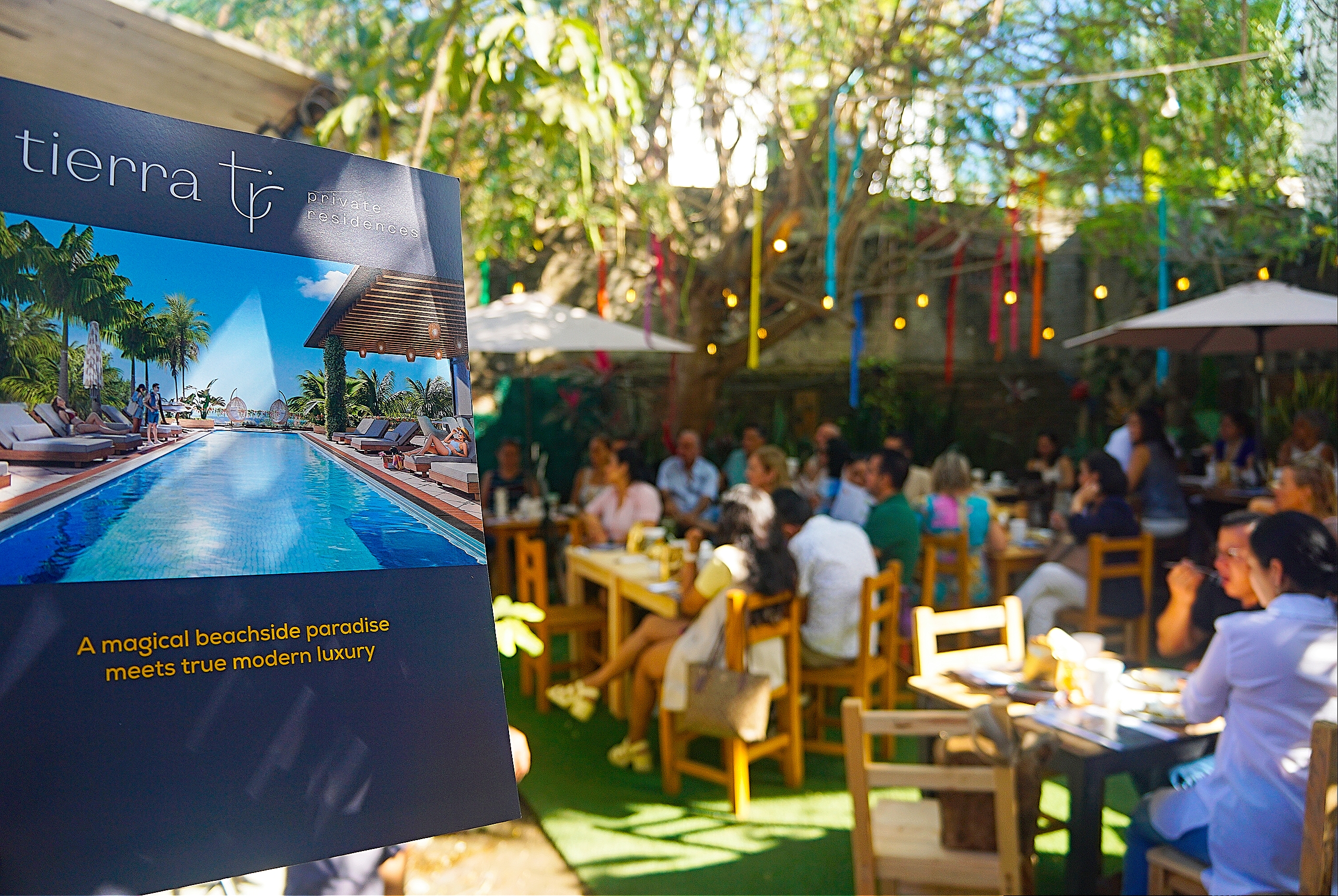 Café inmobiliario de AMPI Riviera Nayarit en San Pancho con presentación de Tierra TC Private Residences y networking profesional.